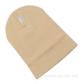 100% acryl kids beanie hoed met lederen patch